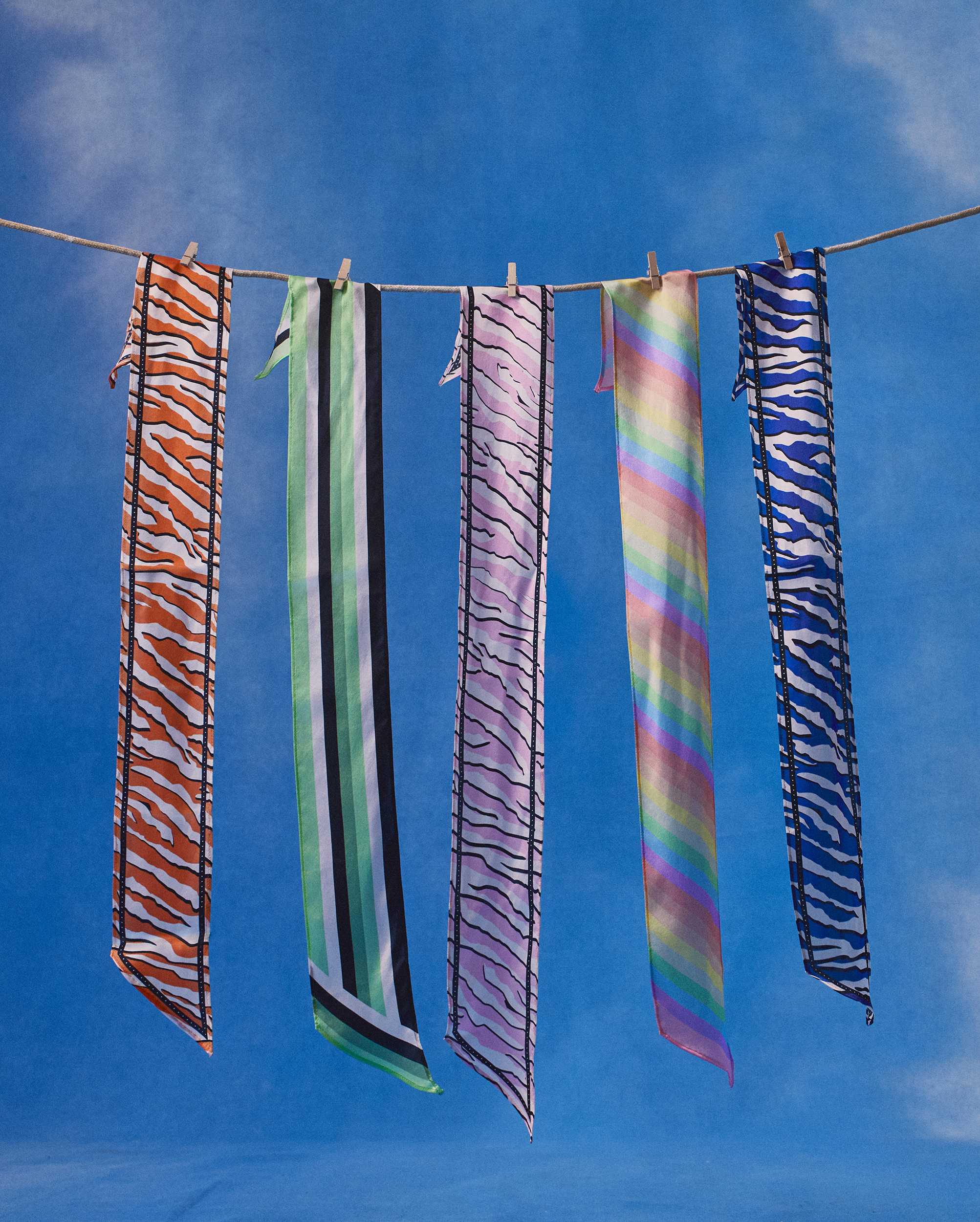 Silk scarfs hanging to dry