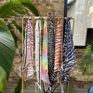 Available in an array of sizes colours and designs. Wear our pure silk scarfs as a head band tied loosely around your neck or loop around the top handle of a favourite tote. All made in England    fairfashion naturalmaterials print madeinuk london sustainablefashion fashion tiger slowfashion ethicalfashion digitalillustration stripes scarf scarfstyle styleinspo love coaldropsyard kingscross cdy wolfandbadger