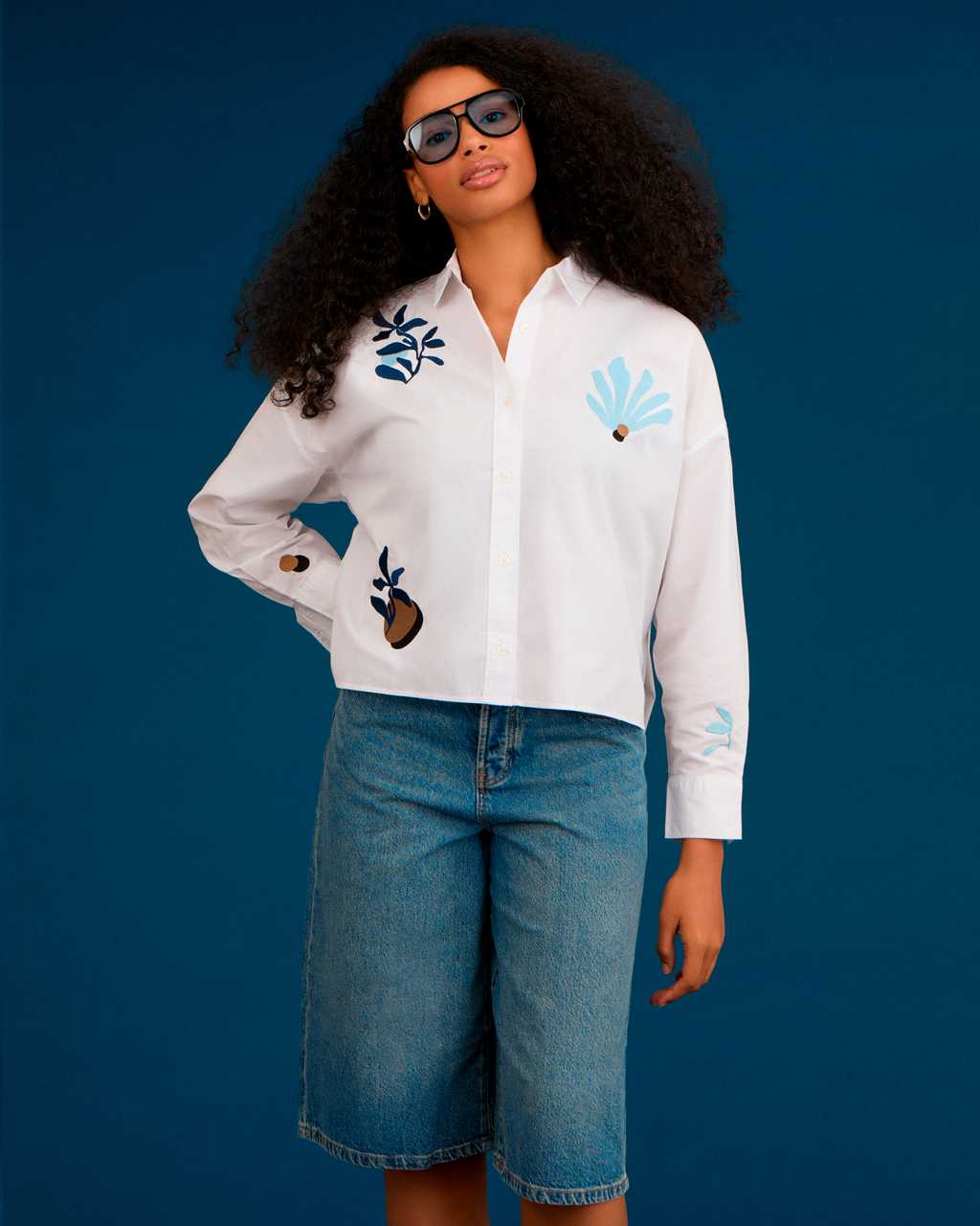 Women wearing an INGMARSON  embroidered shirt